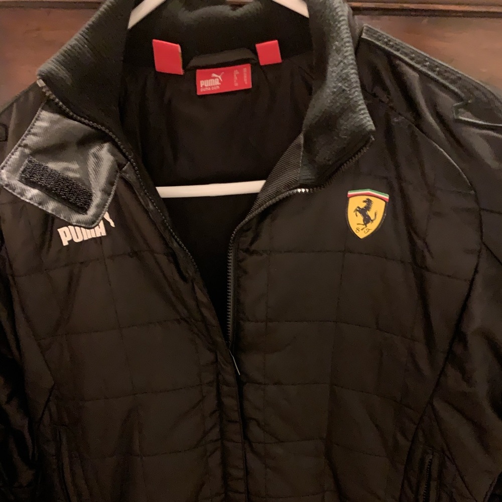 Gently used black Puma Ferrari Jacket size XS.